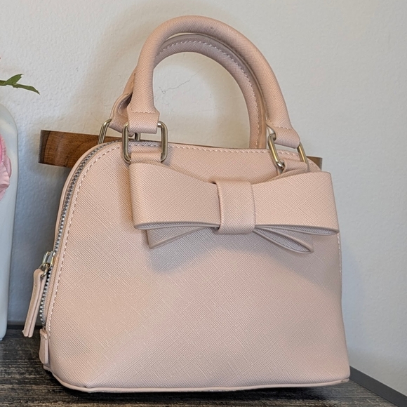 Betsey Johnson Handbags - Betsey Johnson Pink Mini Bag with Bow Detail NWOT